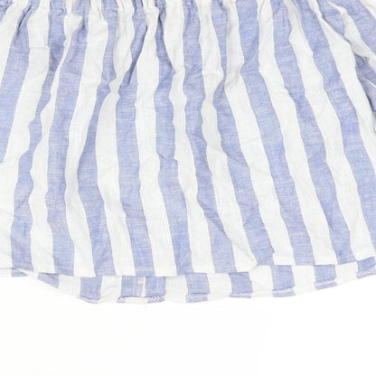 Brand and care label for Miss Selfridge women’s blue striped linen basic blouse, size UK 4, off the shoulder - button detail