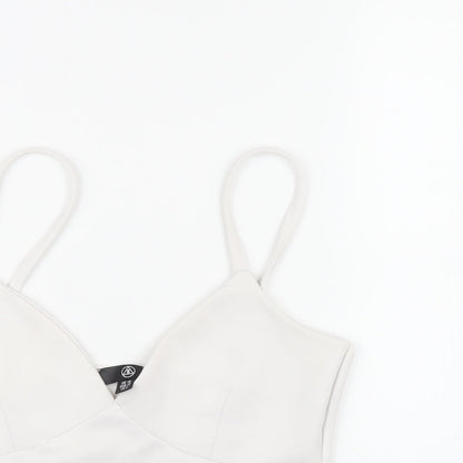 Close-up detail of Missguided women’s white polyester cropped t-shirt, size UK 10, v-neck