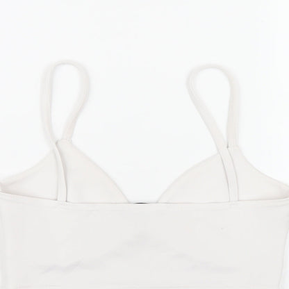 Brand and care label for Missguided women’s white polyester cropped t-shirt, size UK 10, v-neck