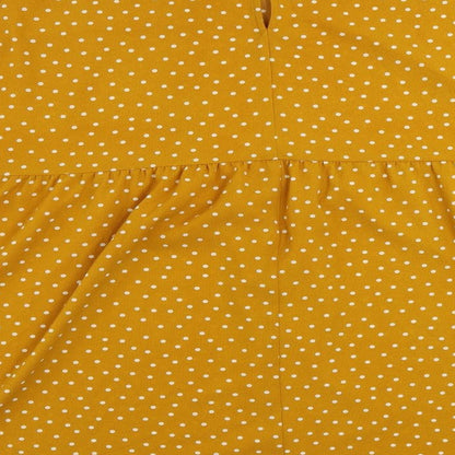 Brand and care label for ASOS women’s yellow polka dot polyester a-line, size UK 24, round neck button