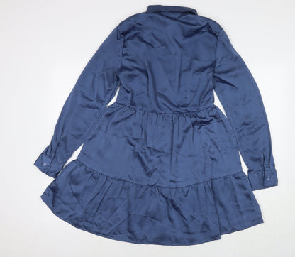 Back view of Missguided women’s blue polyester shirt dress, size UK 12, collared button