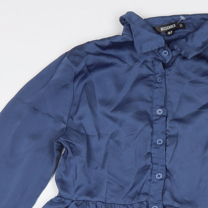 Close-up detail of Missguided women’s blue polyester shirt dress, size UK 12, collared button