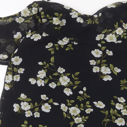 Brand and care label for Missguided women’s black floral polyester a-line, size UK 8, v-neck pullover