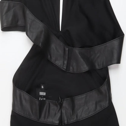 Brand and care label for Missguided women’s black polyester bodycon, size UK 10, halter zip