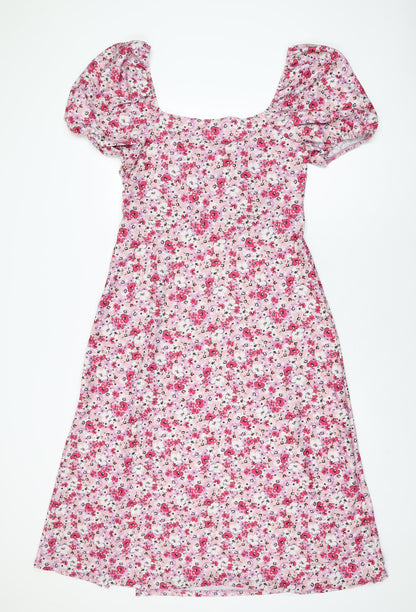 Back view of Miss Selfridge women’s pink floral polyester a-line, size UK 16, sweetheart pullover