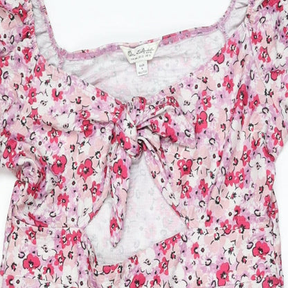Close-up detail of Miss Selfridge women’s pink floral polyester a-line, size UK 16, sweetheart pullover