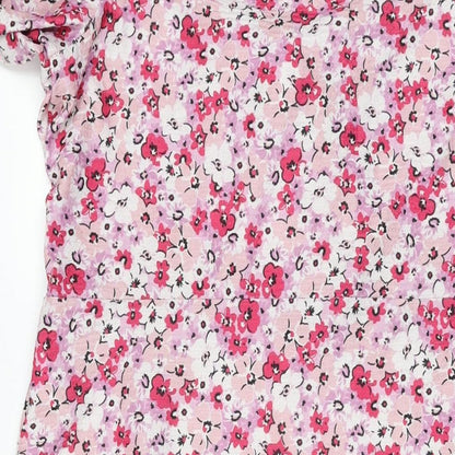 Brand and care label for Miss Selfridge women’s pink floral polyester a-line, size UK 16, sweetheart pullover