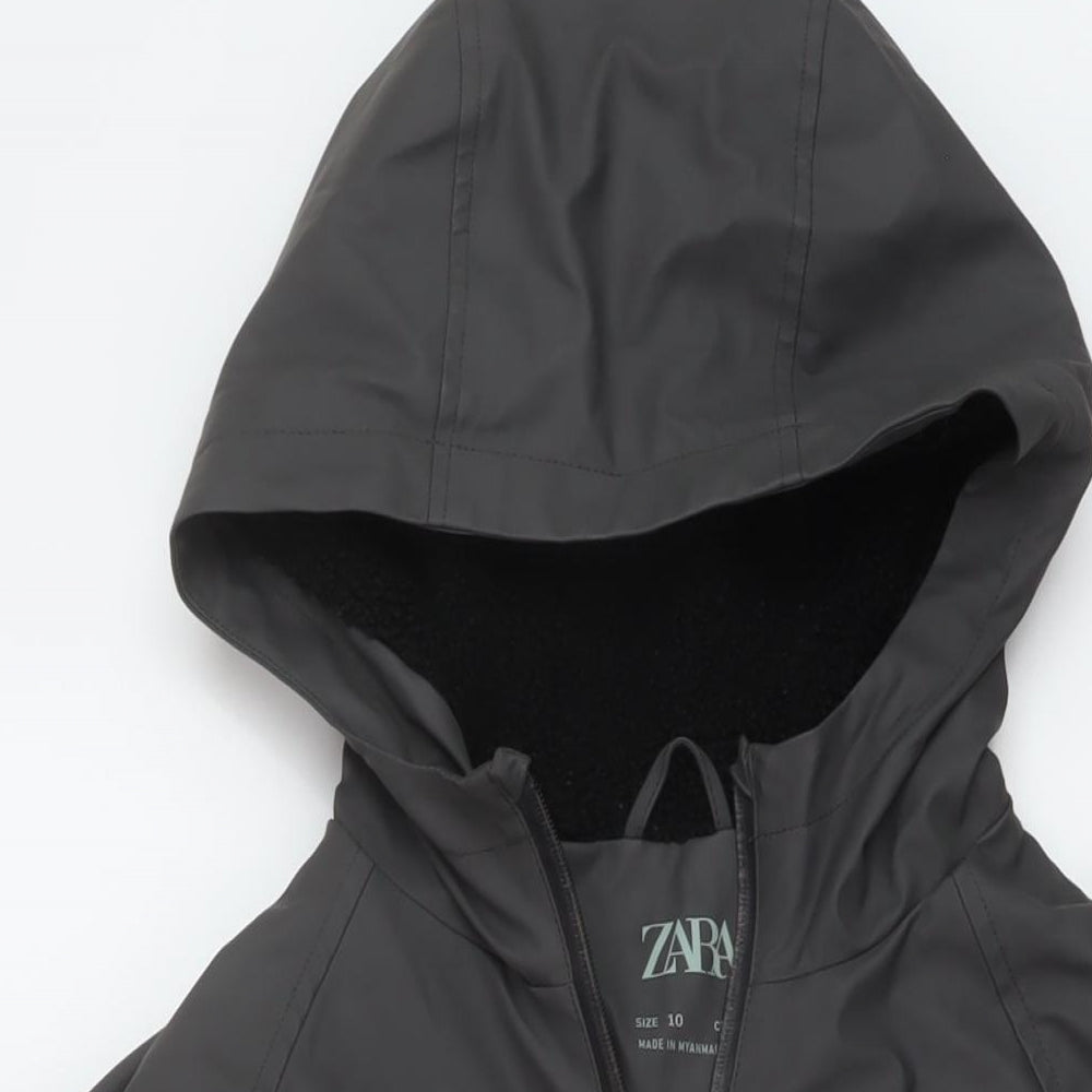Close-up detail of Zara boys’ grey rain coat coat, size 10, years zip