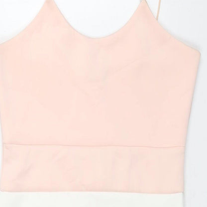 Close-up detail of Misguided women’s pink colourblock polyester mini, size UK 10, scoop neck pullover