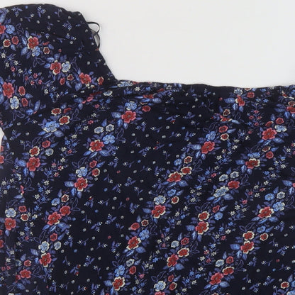 Brand and care label for Principles women’s blue floral viscose basic blouse, size UK 10, round neck