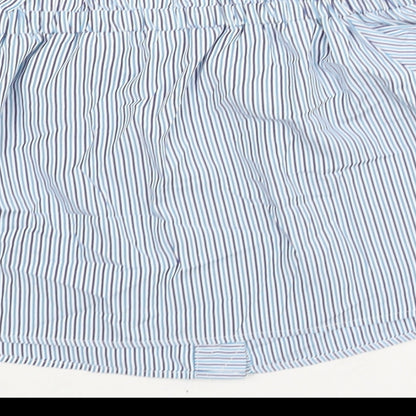 Brand and care label for Missguided women’s blue striped polyester basic blouse, off the shoulder - rouched button detail