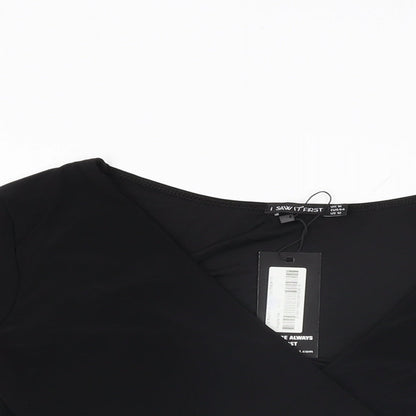 Close-up detail of I SAW IT FIRST women’s black polyester wrap t-shirt, size UK 16, v-neck