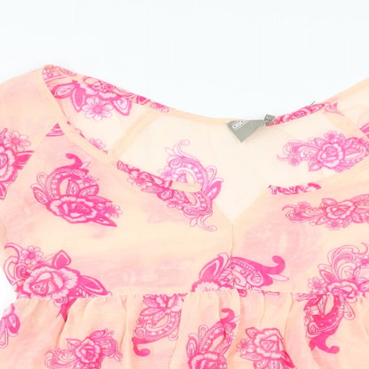 Close-up detail of ASOS women’s pink floral polyester mini, size UK 8, scoop neck pullover - sheer