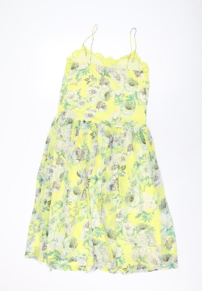 Back view of ASOS women’s yellow floral polyester a-line, size UK 2, v-neck pullover