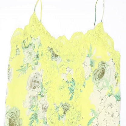 Close-up detail of ASOS women’s yellow floral polyester a-line, size UK 2, v-neck pullover
