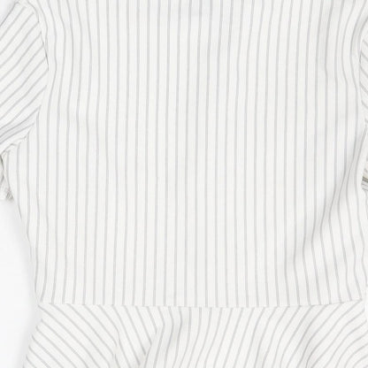 Brand and care label for Miss Selfridge women’s white striped polyester basic t-shirt, size UK 8, round neck