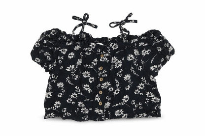 Front view of Next girls’ black floral viscose basic blouse, size 6, years square neck pullover