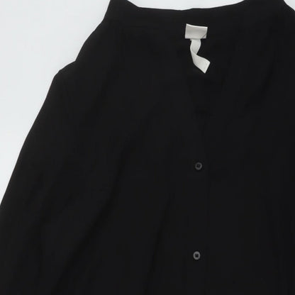 Close-up detail of h7M women’s black polyester tunic blouse, size UK 10, v-neck