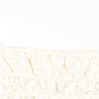 Close-up detail of H&M girls’ white floral cotton basic t-shirt, size 10-11, years off the shoulder pullover