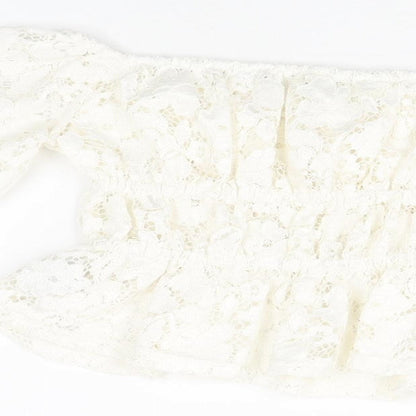 Brand and care label for H&M girls’ white floral cotton basic t-shirt, size 10-11, years off the shoulder pullover