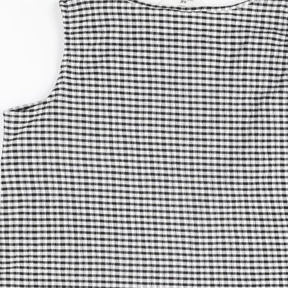 Brand and care label for H&M girls’ black gingham polyester basic t-shirt, size 11-12, years round neck pullover