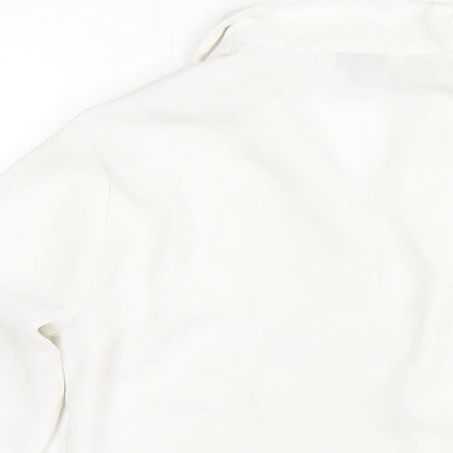 Brand and care label for Miss Selfridge women’s white polyester basic button-up, size UK 8, collared