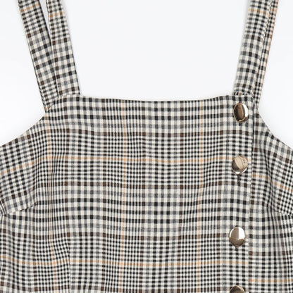 Close-up detail of Miss Selfridge women’s multicoloured plaid polyester a-line, size UK 14, square neck zip