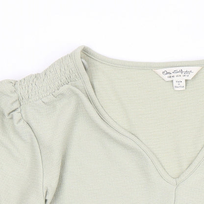 Close-up detail of Miss Selfridge women’s green polyester tunic blouse, size UK 12, v-neck