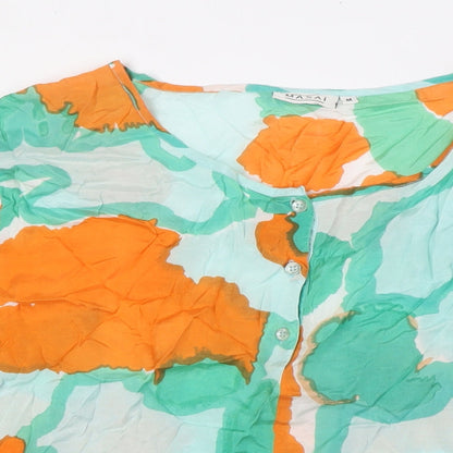 Close-up detail of Masai women’s multicoloured polyester basic blouse, size M, boat neck
