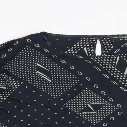 Close-up detail of Autograph women’s blue geometric silk basic blouse, size UK 16, round neck