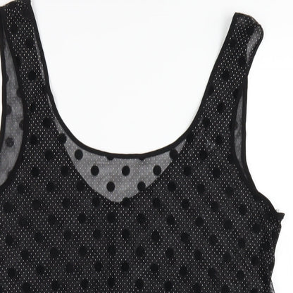 Close-up detail of Miss Selfridge women’s black polka dot polyester basic tank, size UK 12, scoop neck
