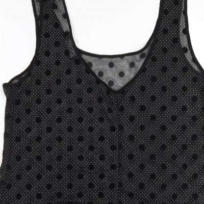 Brand and care label for Miss Selfridge women’s black polka dot polyester basic tank, size UK 12, scoop neck