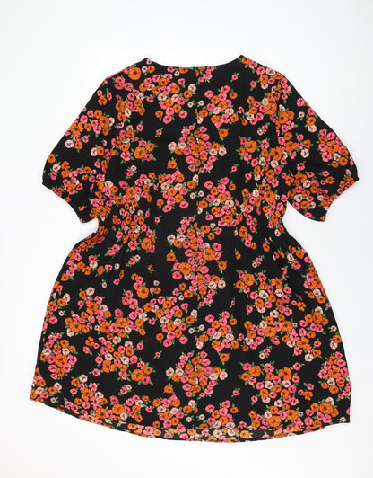 Back view of JD Williams women’s black floral polyester a-line, size UK 20, v-neck pullover