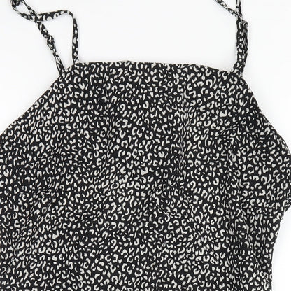 Close-up detail of Missguided women’s black geometric polyester a-line, size UK 16, square neck zip
