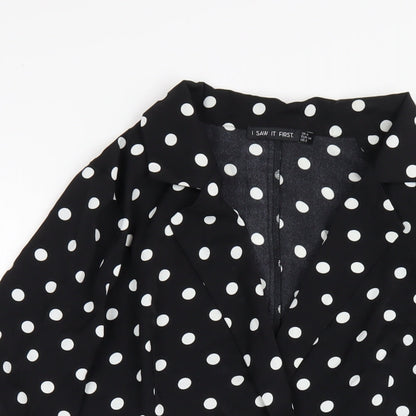 Close-up detail of I SAW IT FIRST women’s black polka dot polyester jacket dress, size UK 6, collared button