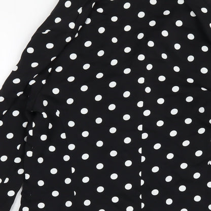 Brand and care label for I SAW IT FIRST women’s black polka dot polyester jacket dress, size UK 6, collared button