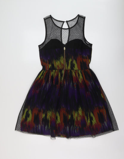 Back view of Be Beau women’s multicoloured geometric polyester a-line, size UK 12, round neck zip