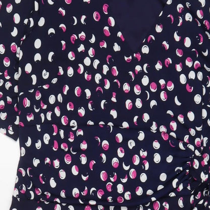 Close-up detail of Kaleidoscope women’s purple geometric polyester a-line, size UK 14, v-neck pullover