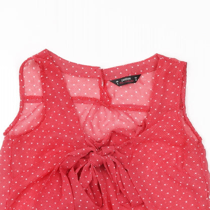 Close-up detail of Miss Selfridge women’s red polka dot polyester basic blouse, size UK 6, square neck