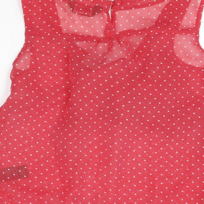 Brand and care label for Miss Selfridge women’s red polka dot polyester basic blouse, size UK 6, square neck