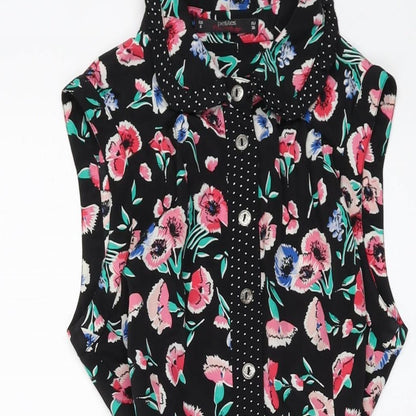 Close-up detail of Miss Selfridge women’s black floral polyester a-line, size UK 8, collared button