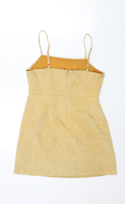 Back view of Cooperative women’s yellow cotton mini, size M, square neck zip
