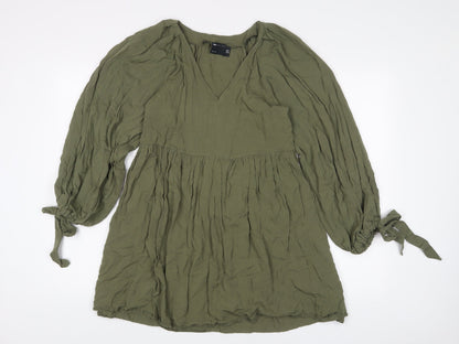 Additional front view of ASOS women’s green viscose a-line, size UK 10, v-neck pullover