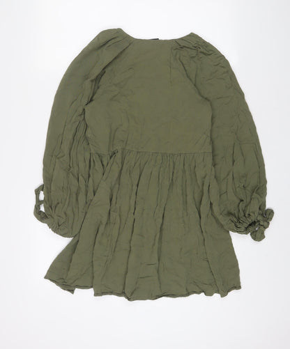 Back view of ASOS women’s green viscose a-line, size UK 10, v-neck pullover