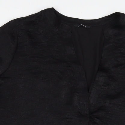 Close-up detail of Roman women’s black polyester tunic blouse, size UK 16, v-neck