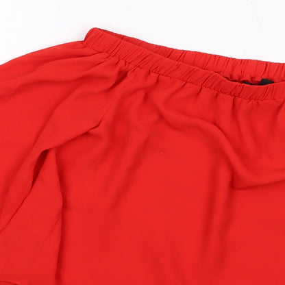 Brand and care label for ASOS women’s red polyester basic blouse, size UK 10, square neck
