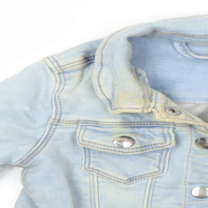 Close-up detail of Matalan girls’ blue jacket, size 2-3, years snap - distressed look