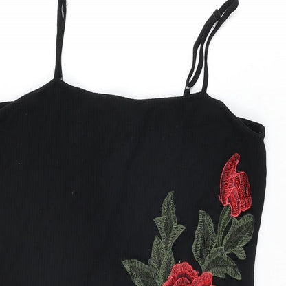 Close-up detail of ASOS women’s black floral viscose mini, size UK 14, square neck pullover