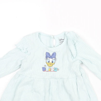 Close-up detail of Disney girls’ blue cotton a-line, size 12-18, months round neck button - daisy duck print