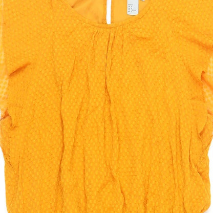 Close-up detail of H7M women’s orange polyester a-line, size UK 12, round neck button - textured